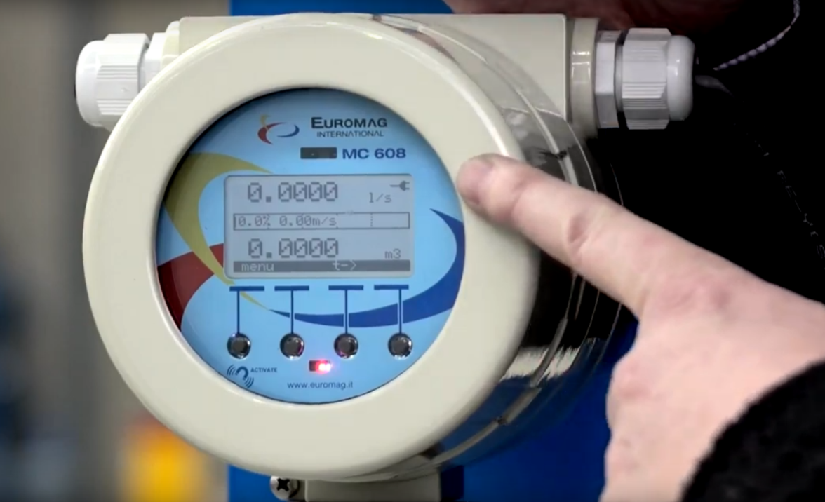 Euromag A hand pointing to a Euromag flow meter